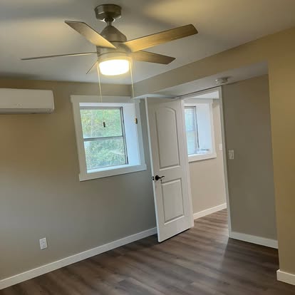Basement room with window and doorway