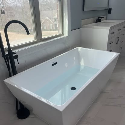 Freestanding tub detail and clean modern finishes