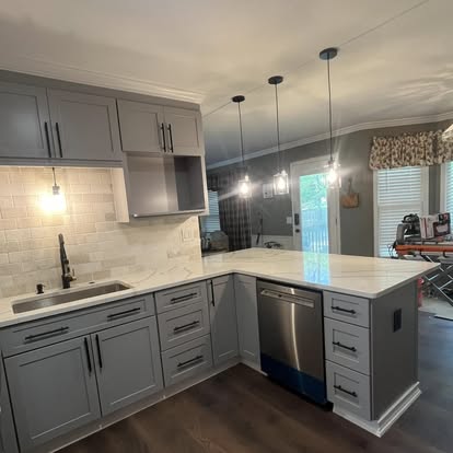 L-shaped kitchen with sink and dishwasher